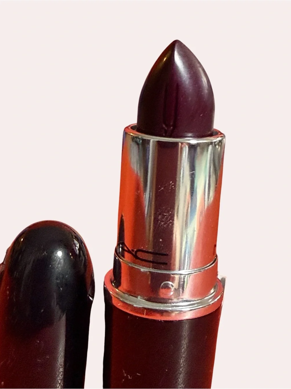 MAC Lustreglass Lipstick in shade, SUCCUMB TO PLUM Deep Plum